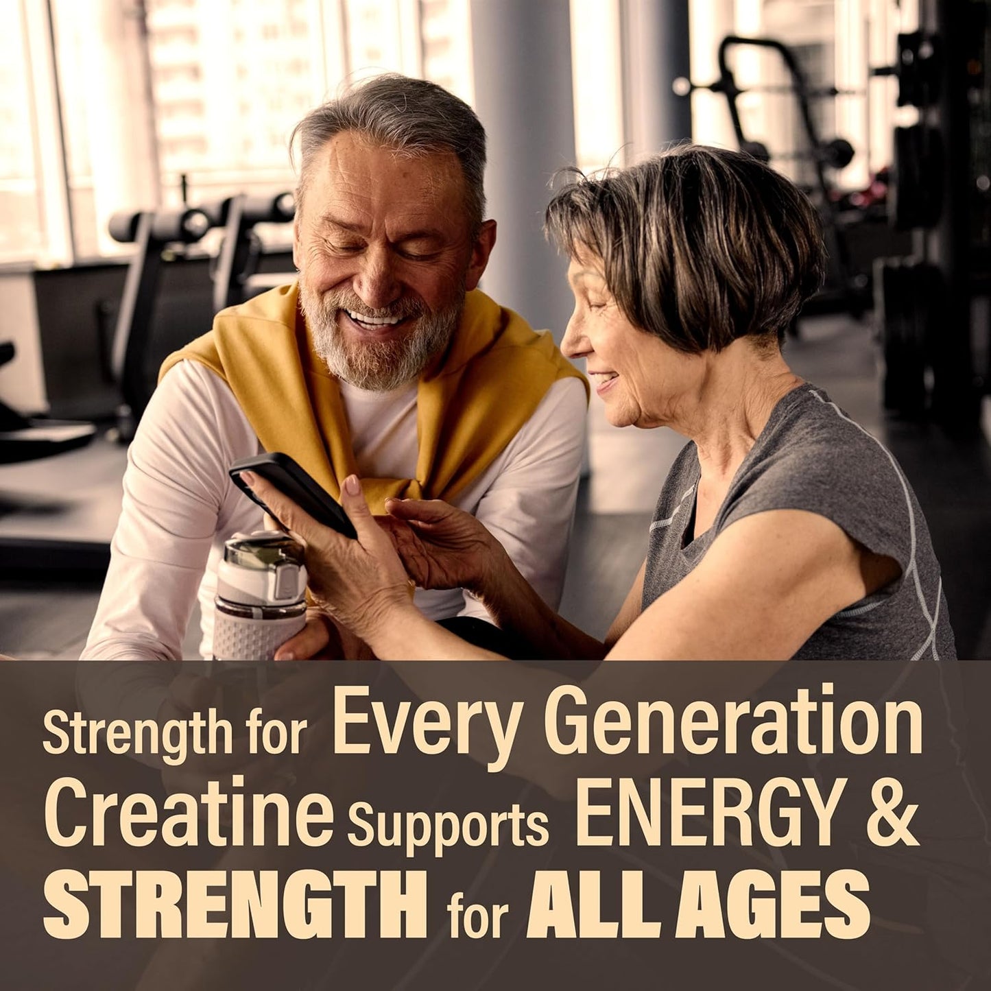 Two people in a gym setting looking at a phone with text about strength support for all ages.