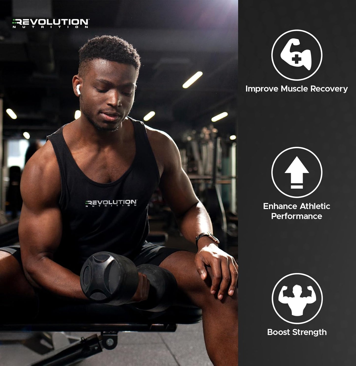 Man in a gym wearing a black tank top with 'Revolution' branding, holding a medicine ball.