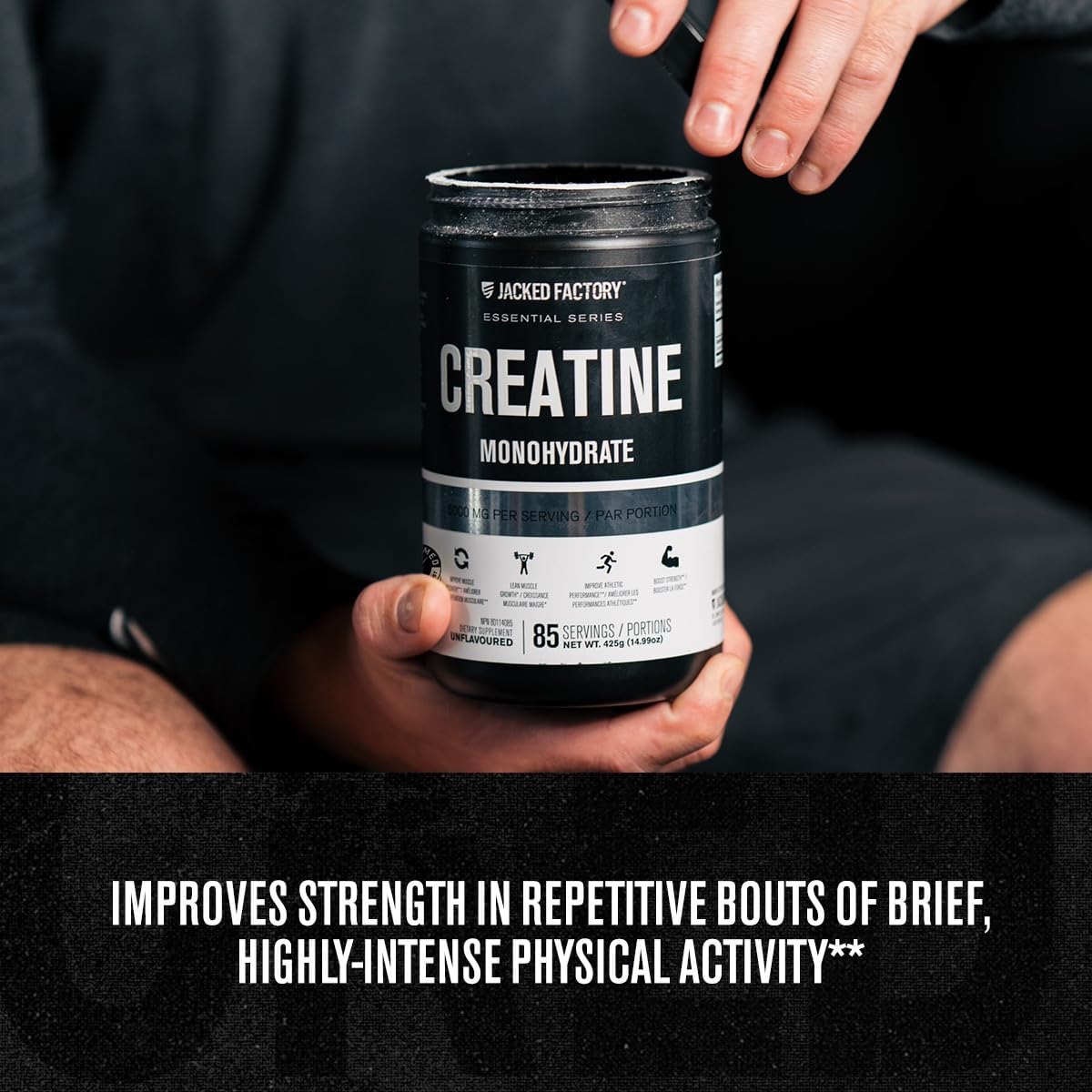 Person holding a creatine supplement container with text about its benefits.