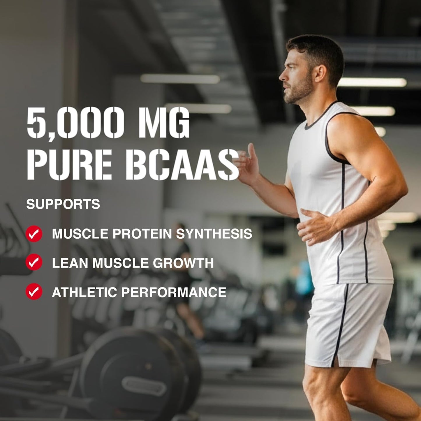 Man in a gym holding a supplement with text about 5,000 mg pure BCAAs.