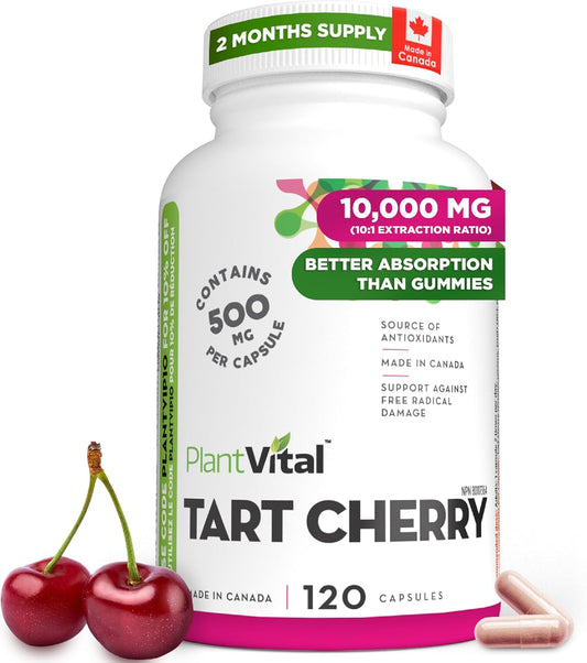 Bottle of PlantVital Tart Cherry supplement with two cherries on a white background